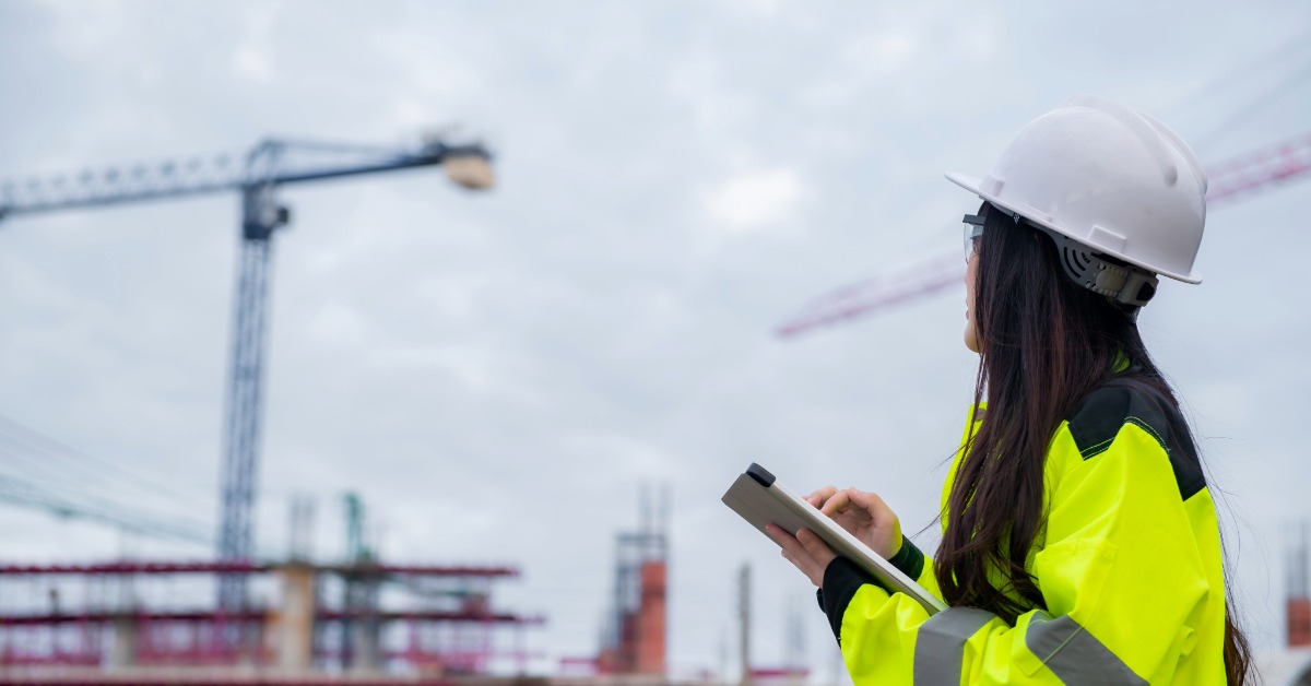 woman looking at construction site
