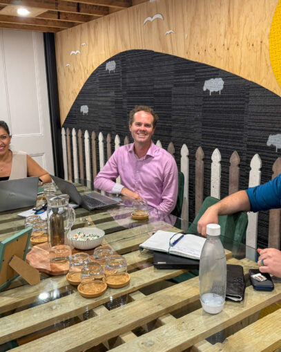 photo of three people in a meeting